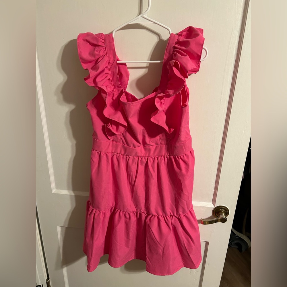 Womens size XL pink short sleeve dress. NWOT. Zips on side